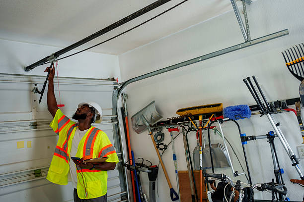 Professional Garage Door Panel Replacement technician working in Oyster Creek, TX